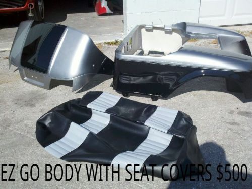 Two tone paint job on a ez go txt or rxv golf cart body.