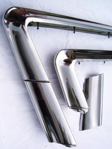 57 chevy gas door, fin trim, 3 piece set show quality.  beware of reproductions