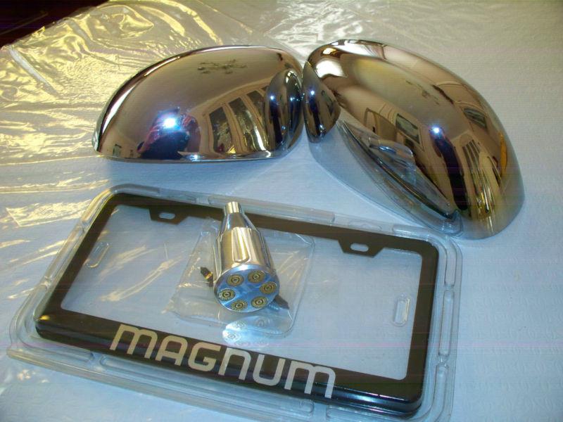 Dodge magnum license plate frame, bullet shifter and chrome mirror covers.
