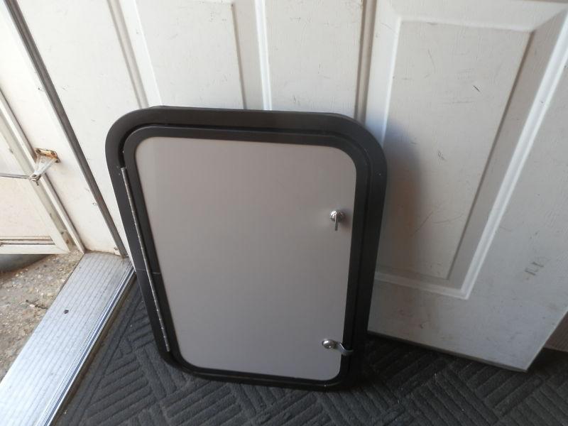 Sell RV CARGO DOOR R.O. 23" X 15" X 2" GREY/BLACK ( USED ) in Bronson