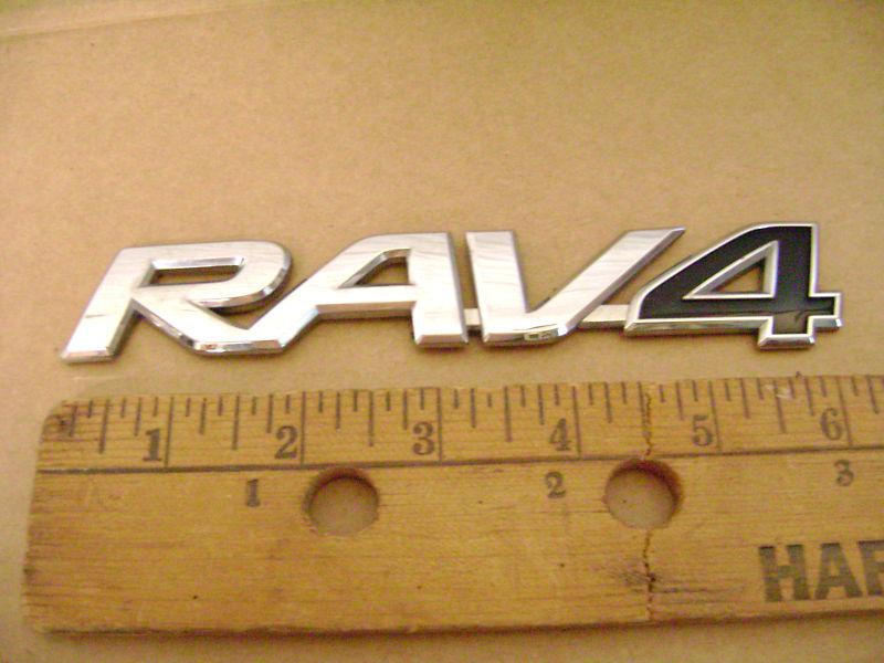Rav 4 chrome & black plastic emblem sticker 6 5/16 inches wide 