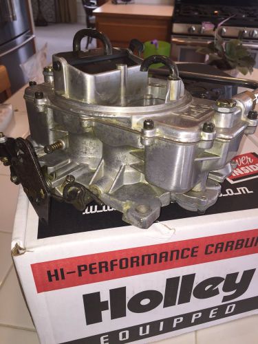 Used marine holley 4010, rebuilt,, new choke cap mastercraft indmar 351