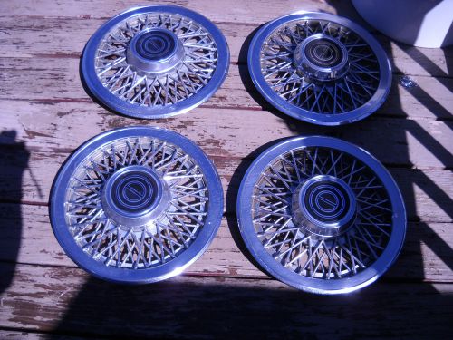 Four hubcaps 14" rims hub caps