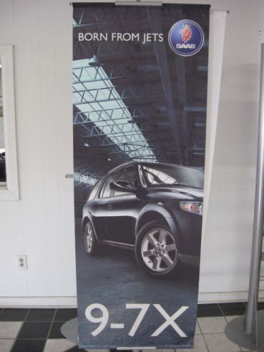 Saab 9-7x "born from jets" banner