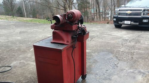 Valve and seat grinder, i used for aircraft engines.