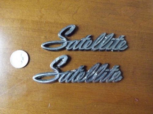 Plymouth satellite metal emblems. - pair in good condition.