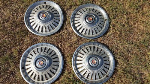 Hubcaps 4 each for 1962 chevy impala
