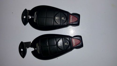 Lot of 2 dodge jeep chrysler  keyless entry fobs remote  fcc 257f 5wy783