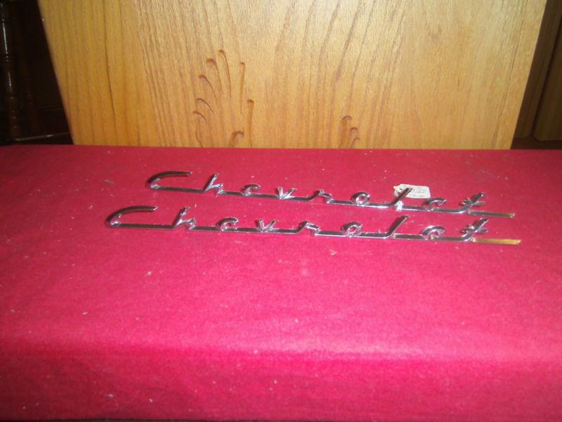 1955-56 chevy 150-210 fender emblem ''chevrolet'', pair, new