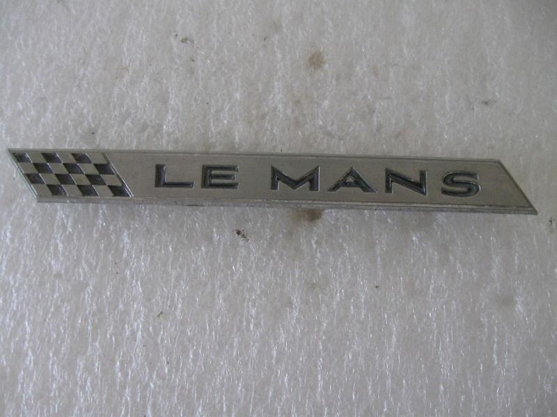   pontiac " le mans "  emblem  badge  script  trim    metal   auto gm lh