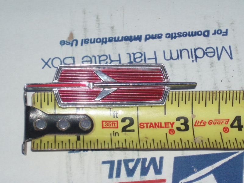 Oldsmobile rocket emblem ?nos?