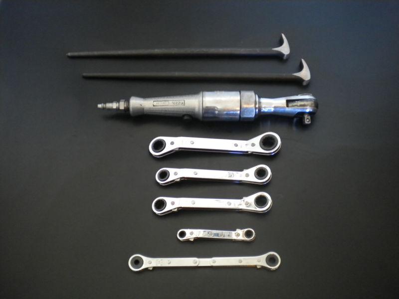 Snap-on tool lot, air ratchet, rolling  pry bars, ratcheting wrenches.