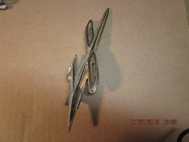 1956 pontiac "v8" fender emblem? used