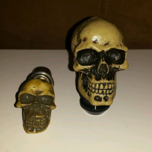 Skull gear shift topper and cigarette lighter stopper