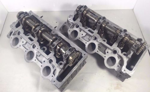 Pair of 4.0l ford cylinder heads casting 8l2e 6050 aa and 6049 aa