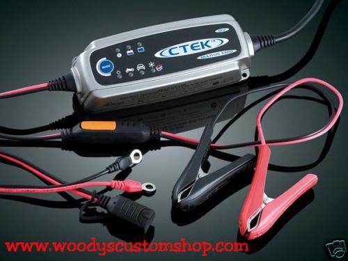 Battery charger/maintainer fits porsche cayman cayenne charges via power port