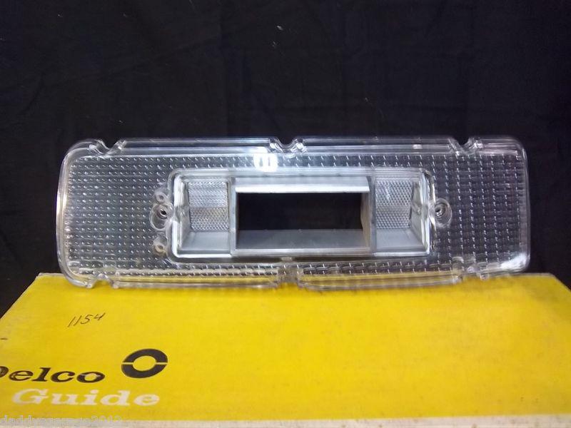 66 olds 98. nos, back up tail light lens. rh