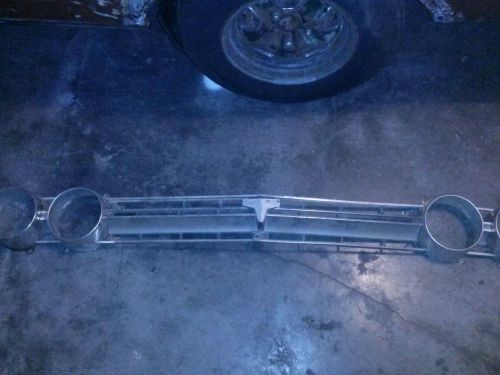 65 olds f 85 grill with headlight buckets
