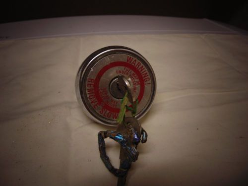 Vintage locking gas cap of a 1966 pickup w/key