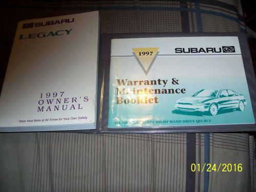 A owners manual&amp; other manual for a 1997 subaru legacy with felt case