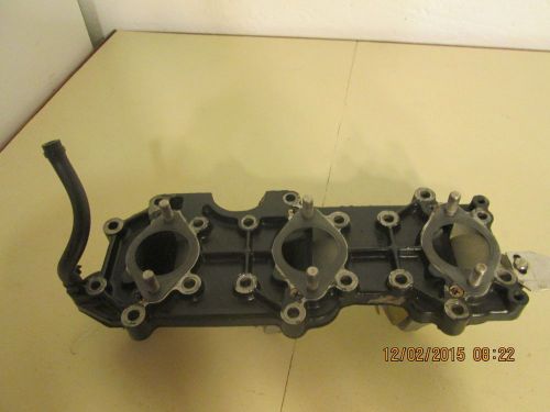 1991 johnson evinrude 70hp intake manifold includes reed valves 389395