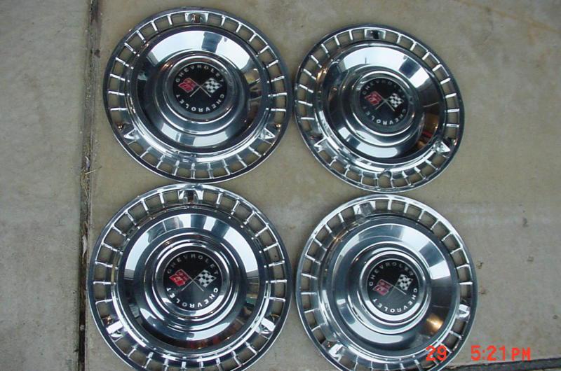 1961 chevrolet impala 14" full wheel covers  very good condition   4 only