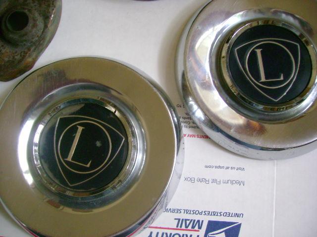 Lancia  no fiat - beta - 70s era- metal hubcaps - 2 - chrome -black shield- nice