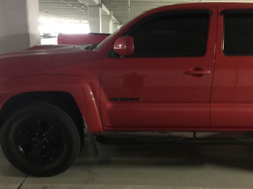 Toyota tacoma driver side black door emblem oem 75427-04020-c1