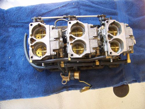 2001 mercury outboard 150 hp  v6 carburetor's and reed valves