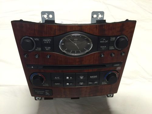 2009 infiniti g37x cd changer with ac heat control bezel used