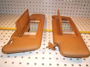 Mercedes w201,190e /w124 300e/300ce palomino lighted exp sun genuine oe 2 visors