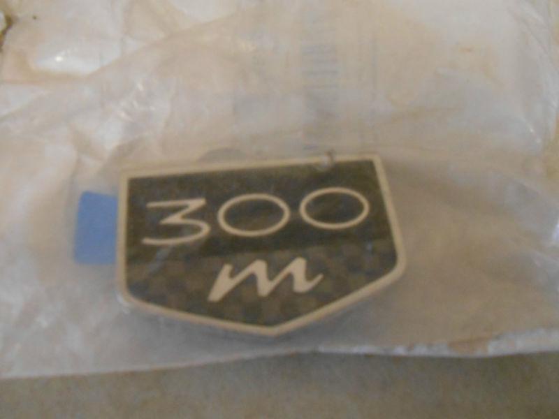 1999,99,00,01,02,03,04 chrysler 300m fender emblem new oem 4805287ac