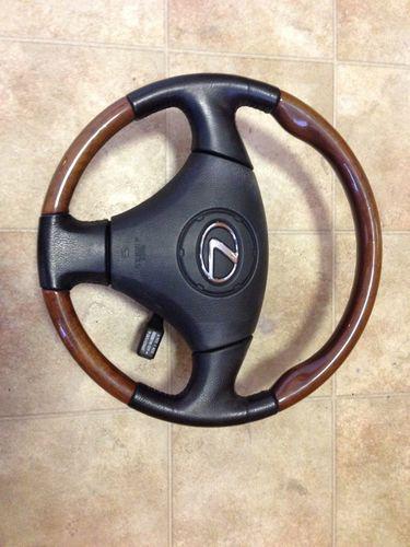98-05 lexus gs300 gs400 gs430 steering wheel wood with black leather and airbag.