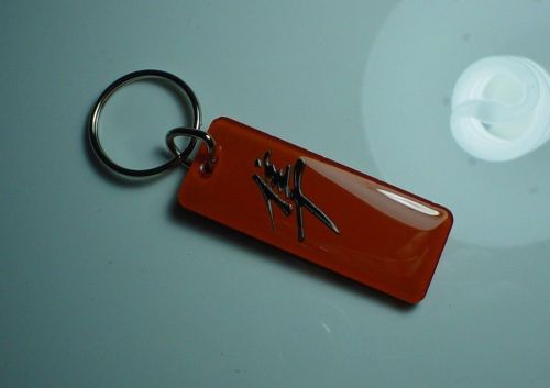 Hayabusa kanji motorcycle key chain orange / black