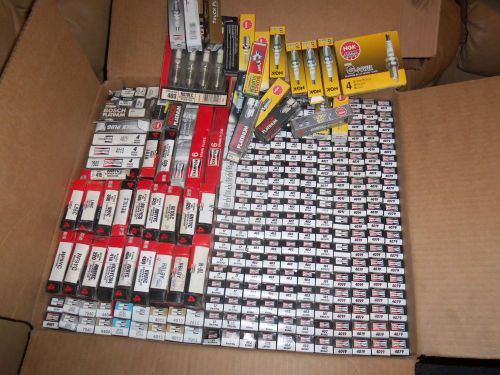 Lot of champion spark plugs w/orig. packaging apx. 350 pcs. awesome deal!!!