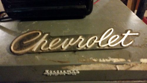 1965,1966 chevrolet grill script.