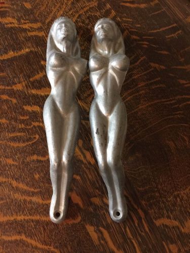 Vintage very vintage, naked lady grab handles off of a 1968 diamond reo