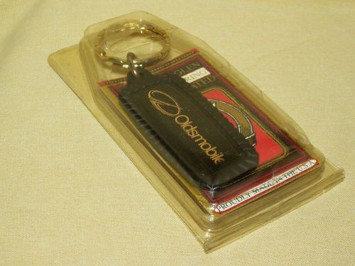 Oldsmobile keyring keychain key ring chain nos highland glen mfg plastic metal.
