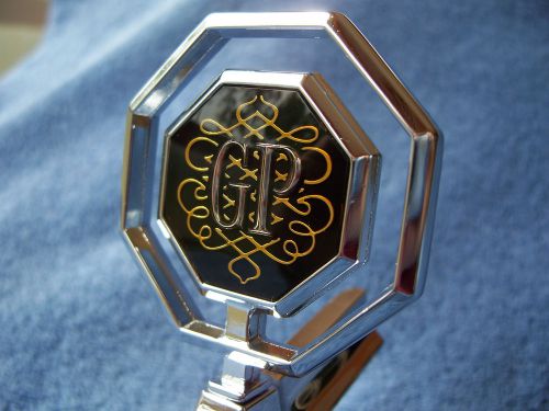 1977 pontiac grand prix hood ornament header emblem nos! oem gm 1976