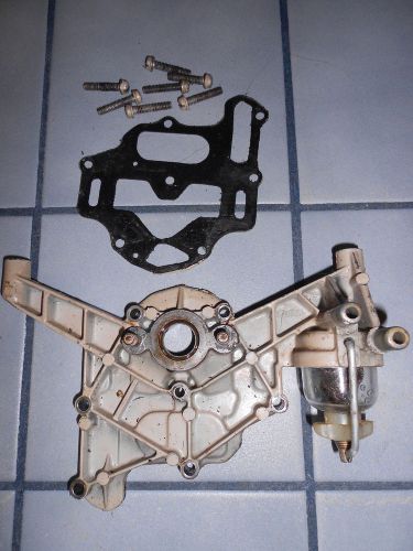 1964 5.5 hp johnson outboard intake manifold, filter bowl, and yoke