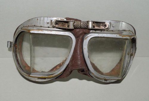 Old pair of ' split lens ' motorcycle goggles - suit vintage car .