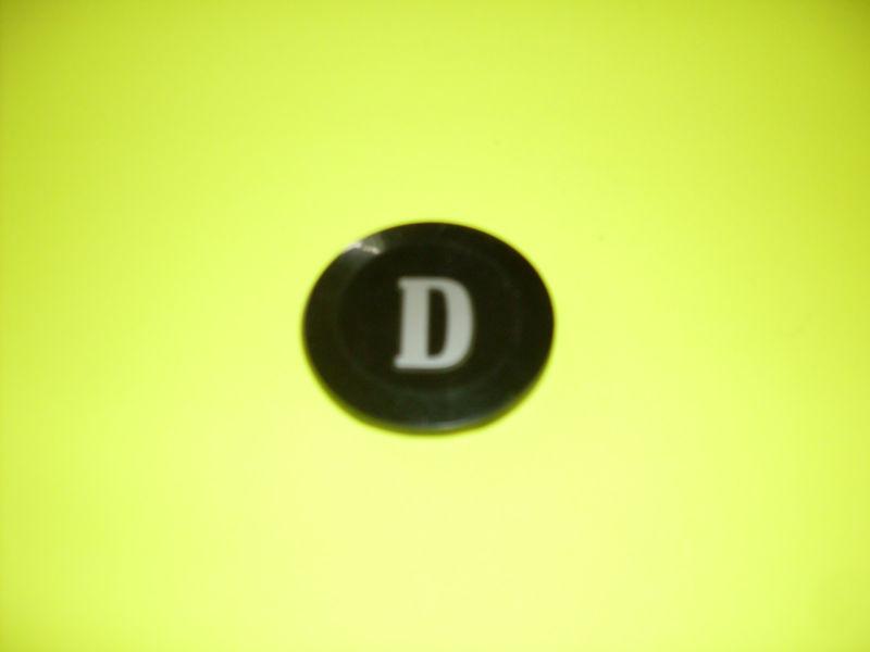 1970,s datsun/b 210 steering wheel center emblem/letter d/hard to find.