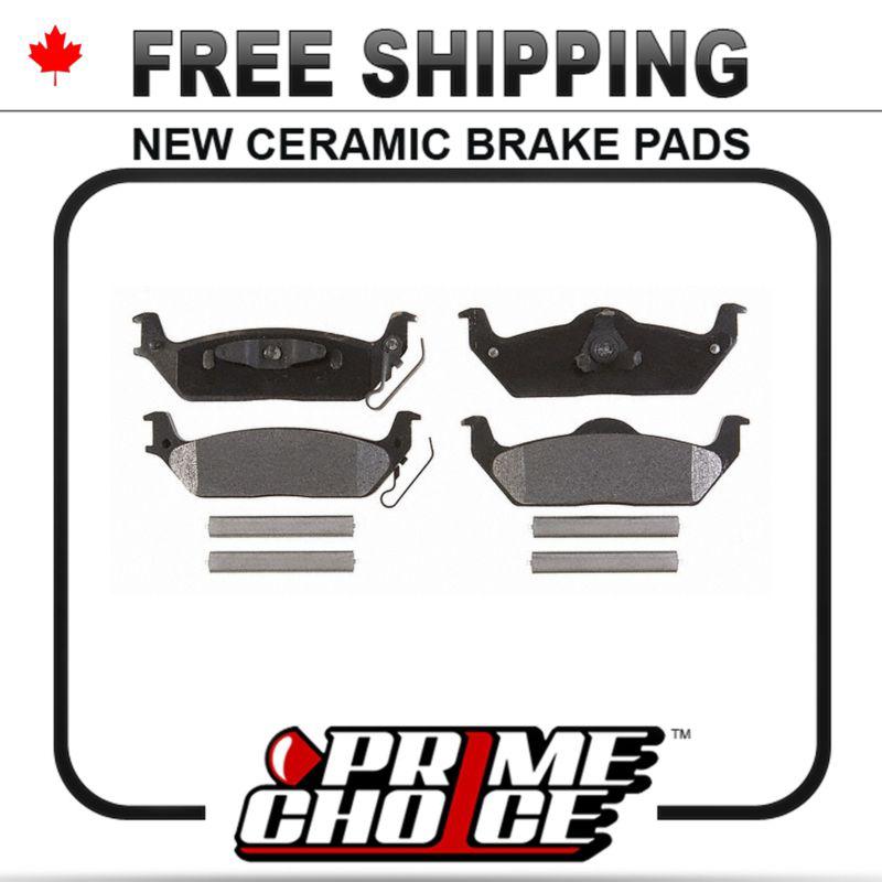 New premium complete set of rear ceramic disc brake pads with shims