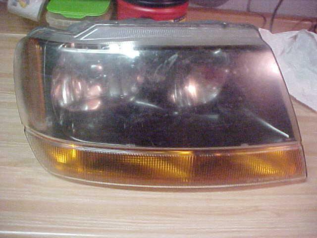99-04 jeep grand cherokee right hand side head light
