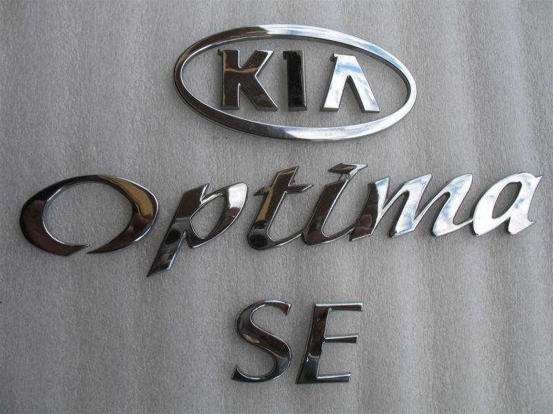 2001 kia optima se set rear trunk chrome emblem logo 01