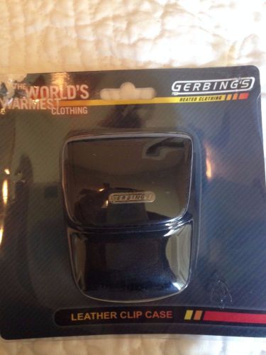 New, never used.  gerbing's heated clothing black leather clip case.