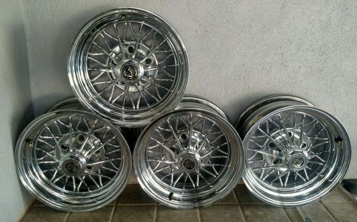 --- cragar star wire wheels crager set of 4 --14 x 6 excellent shape lowrider...