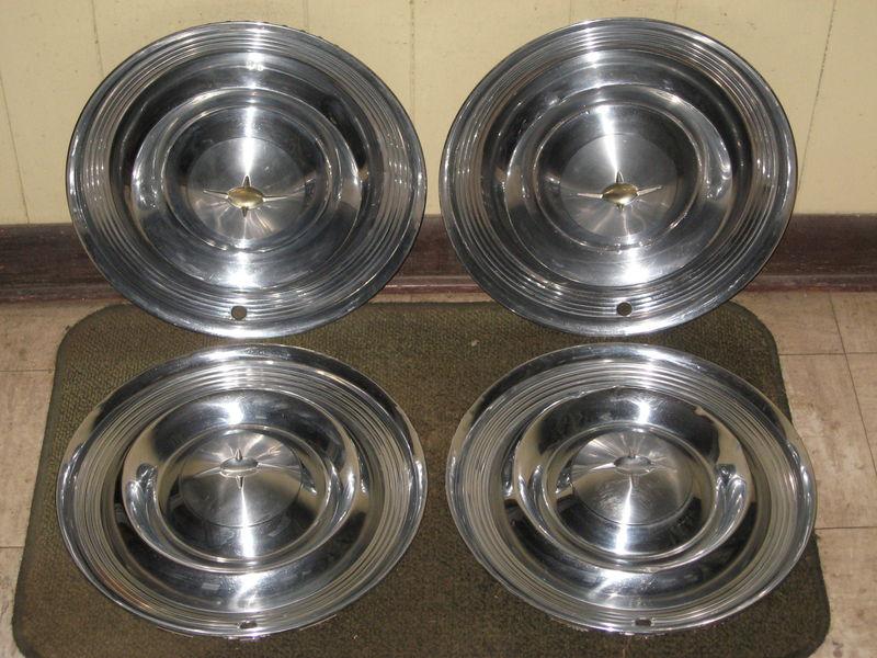 1957 oldsmobile hub caps 14" wheel covers olds set of 4