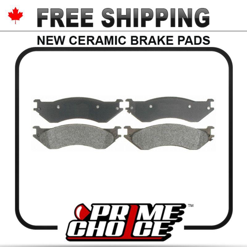 New premium complete set of rear ceramic disc brake pads with shims