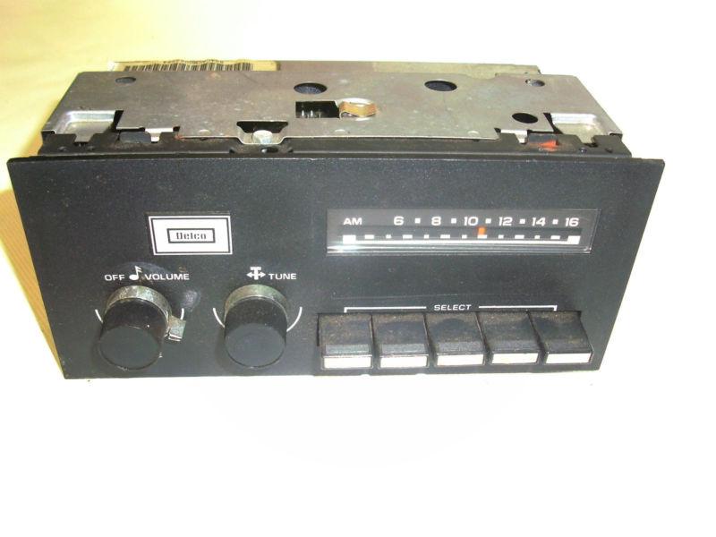Vintage gm delco original push button am radio w/mount brackets- chevy,olds, etc